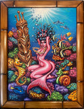 a beautiful sea monkey pin up poses alluringly on a bed of Coral reef. her pet fish, sea horse and sea snail swim around her. A tiki idol protects all.